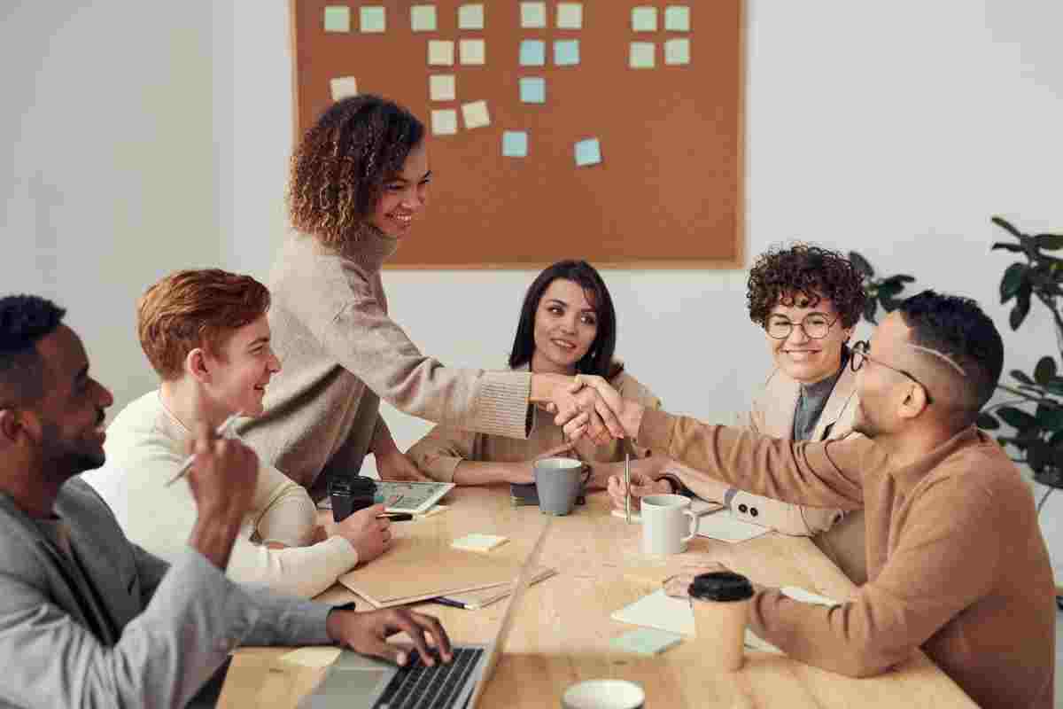 People working together behind a business